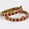A Pair of Gold Enamel Bangle in Ruby & Chakri Diamonds.